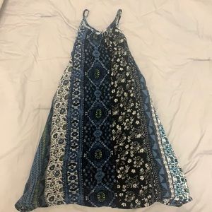 Cute floral print spaghetti strap tank top. Perfect for summer!